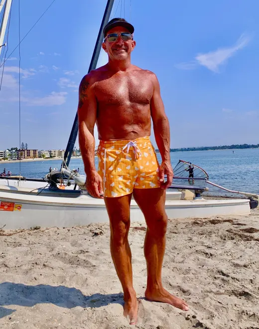 Customer photo from Tony M. wearing Butterfly Yellow Swim Shorts