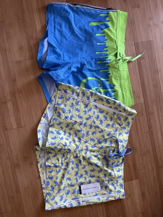 Customer photo from M R. wearing Drip Series Swim Shorts - Green Drip