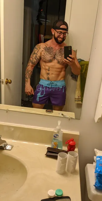 Customer photo from Tyler O. review of Drip Series Swim Shorts - Blue Drip